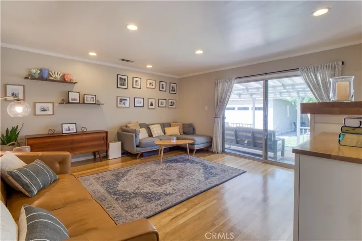 Living room in back for privacy and in/out entertainment value