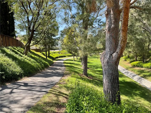 Located just steps from assoc. walking/bike trail.