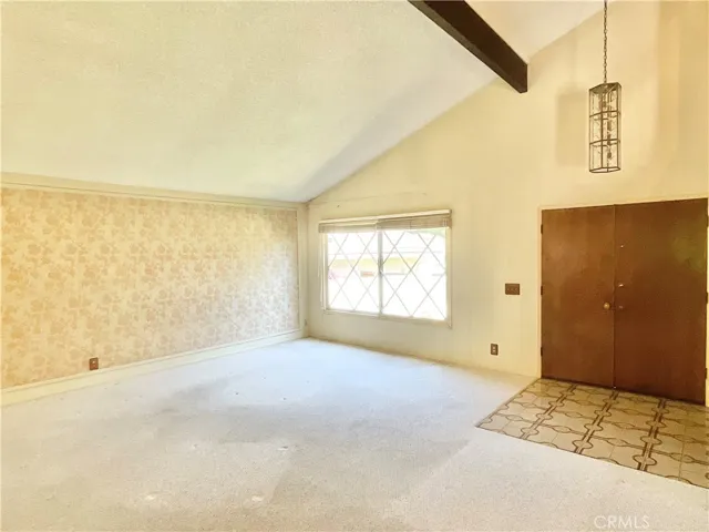 Another shot of living room and entry