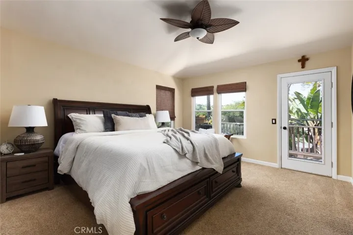 Upstairs the gorgeous master suite has a ceiling fan, vaulted ceiling and a balcony with a canyon view!