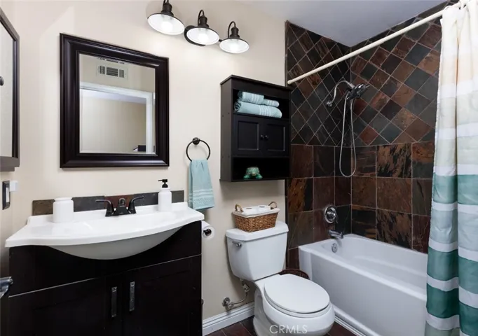 Upgraded full guest bathroom attached to main floor bedroom.