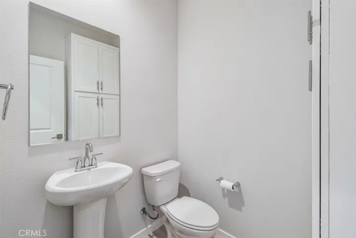 DOWNSTAIRS POWDER ROOM...