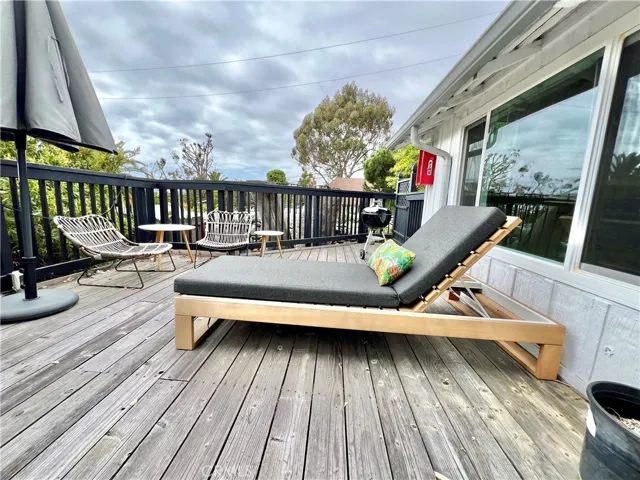 Spacious back deck facing with peek-a-boo ocean view