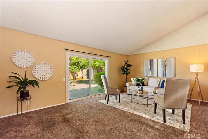 Living room with slider to backyard