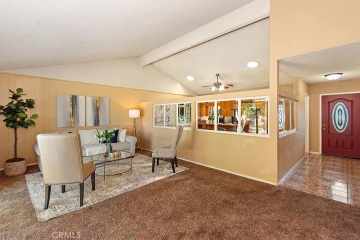 Living room with vaulted ceilings