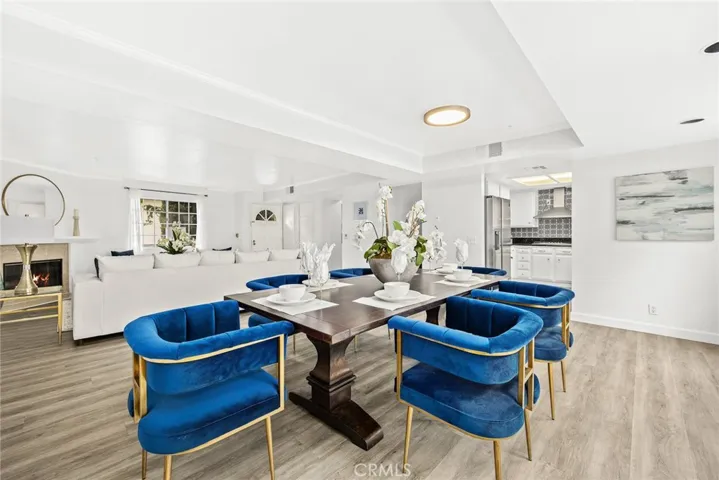 The dining room connects to the living room, facilitating easy communication