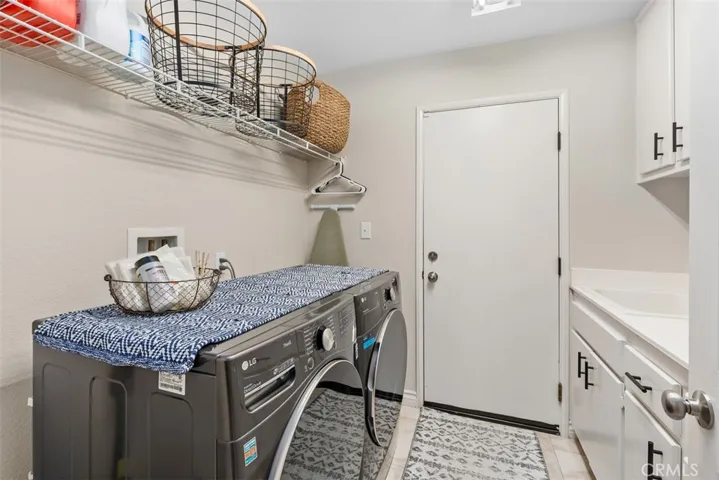 Laundry w/Sink and Wire shelving storage