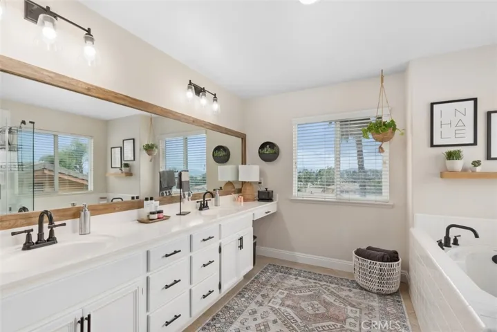 Elegant Primary Bath w/updated fixtures & lighting