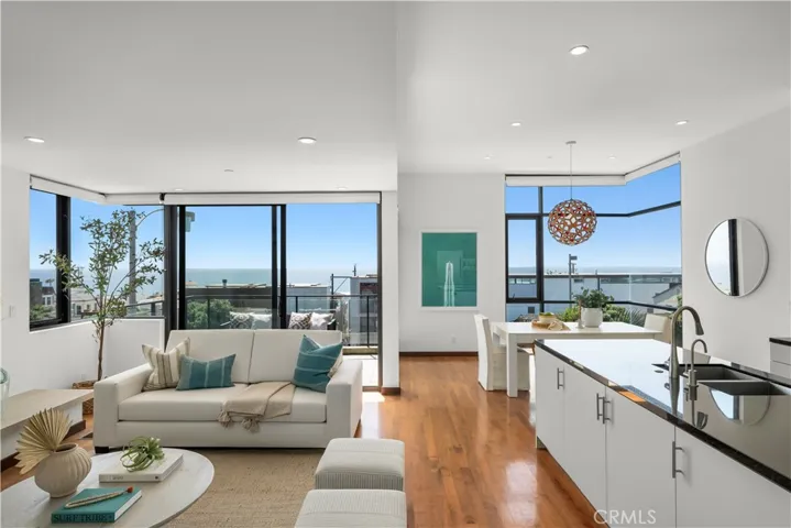 open kitchen, living and dining great room facing west
