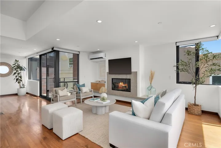 Living room and southern deck, drenched in natural​​‌​​​​‌​​‌‌​​‌​​​‌‌​​​‌​​‌‌​​‌‌​​‌‌​​​​ sunlight.
