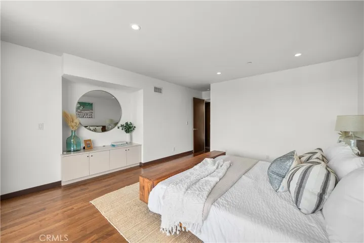 Primary and alcove perfect for a high definition flat screen TV