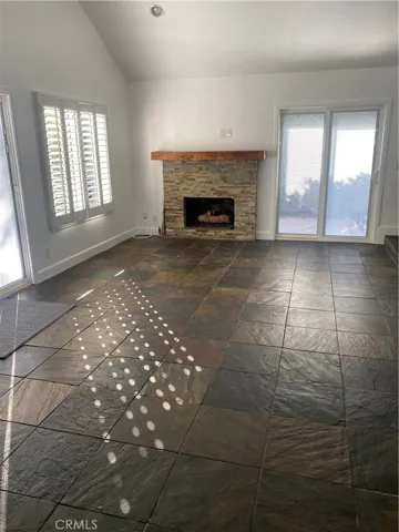 Spacious living room with fire place
