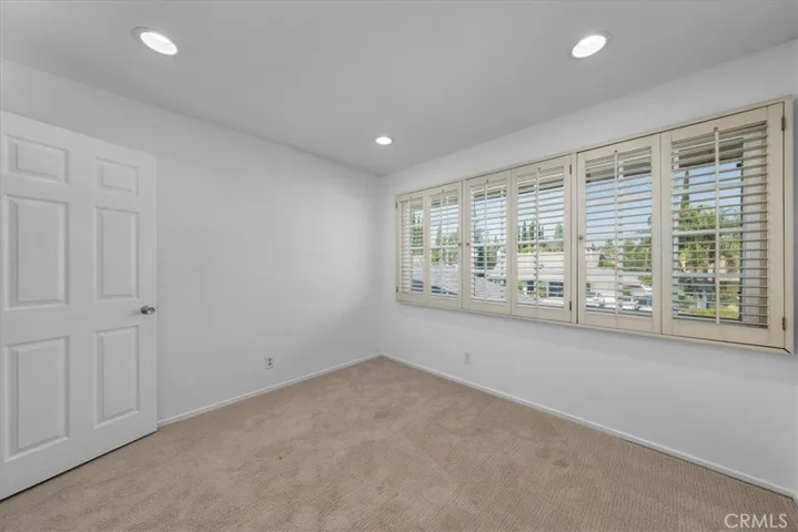 Upstairs bedroom with quiet street view