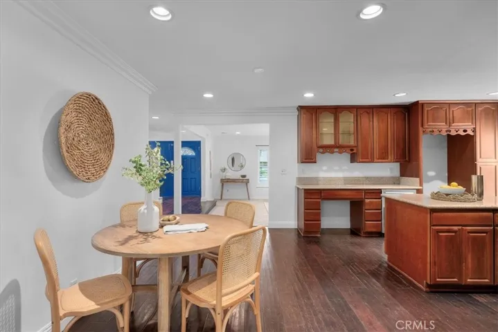 A spacious chef's kitchen with a breakfast area