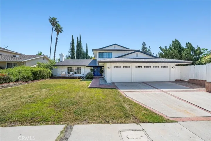 Front of the house showing sidewalk