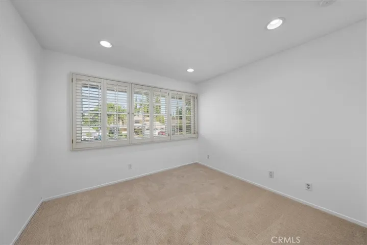 Upstairs bedroom with quiet street view