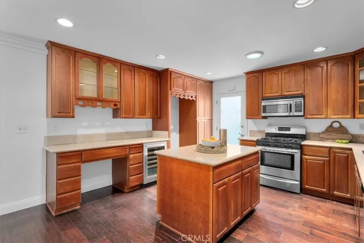 A spacious chef's kitchen with a breakfast area