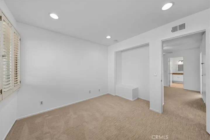 Upstairs bedroom with quiet street view