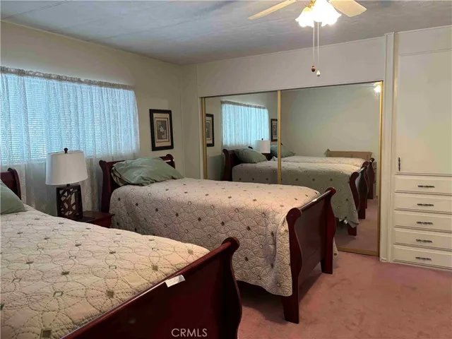 Primary Bedroom with closet and extra built-in drawers and cupboard