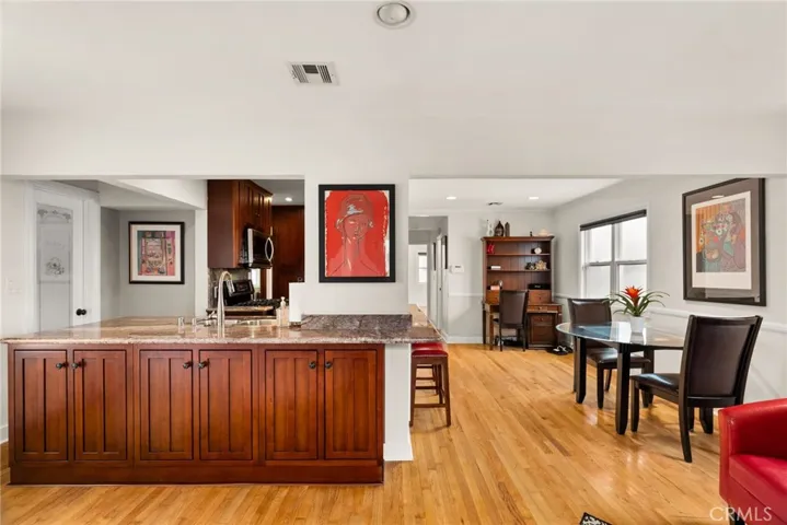 Granite counter tops in the kitchen with great storage.