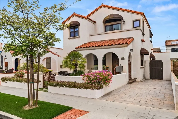 Photo showing a single parking space in front of the home.
