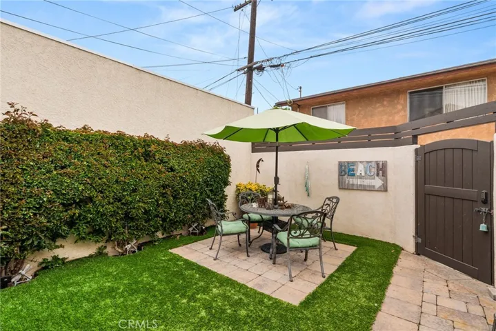 Backyard with turf, less water and fuss.