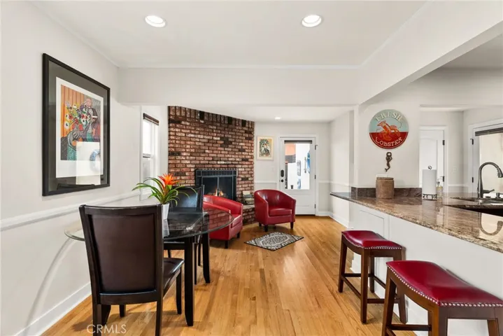 Den with a gas fireplace.  Breakfast bar for a quick bite or and appetizer bar.