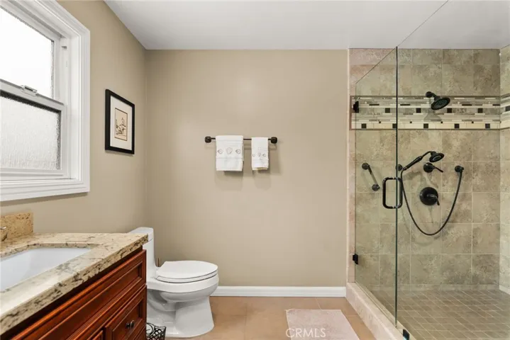 Primary bath oversized step-in shower.