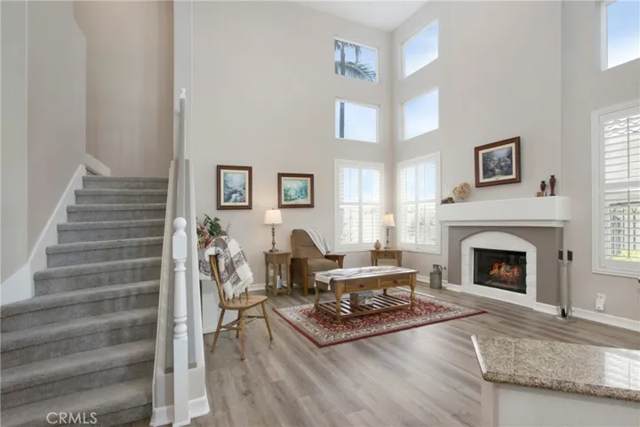 Dramatic formal living with fireplace