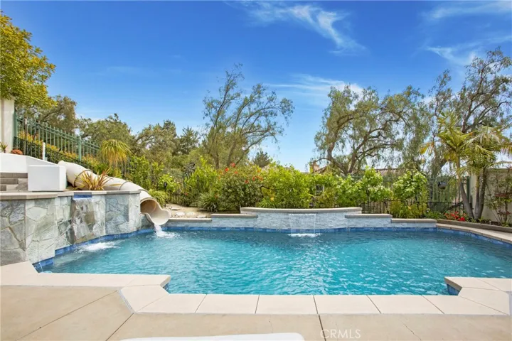 Pool with new coping and stacked stone