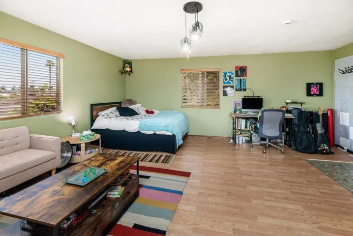 This is the 4th bedroom that is serving as a studio apartment.