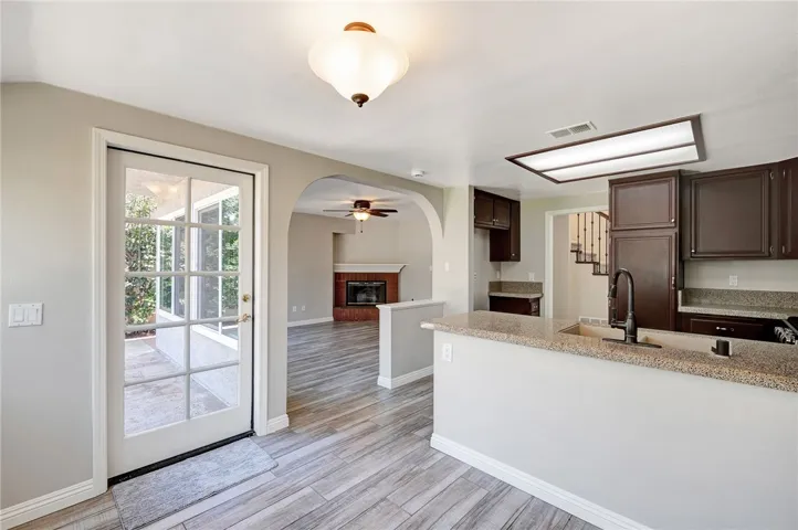 Door from breakfast nook leads to large back yard