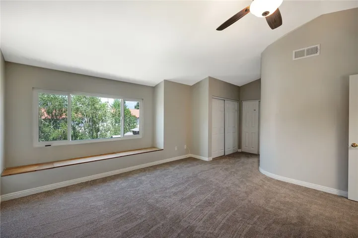 View of extra long window seat in Primary Bedroom