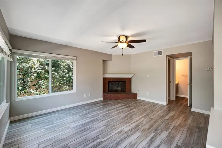 The down stairs features beautiful tile with the wood look