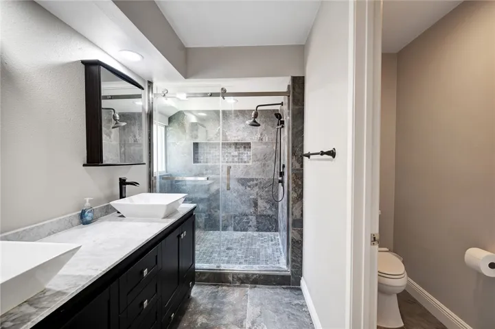 Primary Bath offers a huge walk in shower