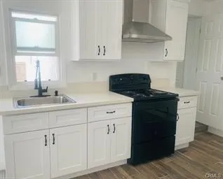 ADU Kitchen with white Shake Cabinets and white Quartz counters