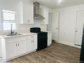 ADU Kitchen with white Shake Cabinets and white Quartz counters