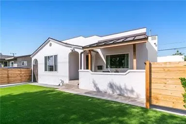 Front of Property with Privacy Fence and Front Porch