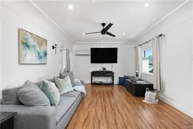 Living Room with Wood Flooring and Front Large Window