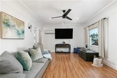 Living Room with Wood Flooring and Front Large Window