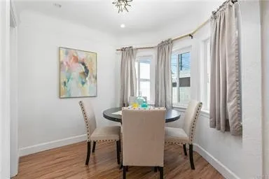 Light & Bright Dining Room off Kitchen