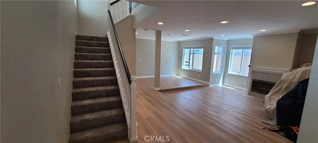 Main entry to the living room and dining room, with fireplace.