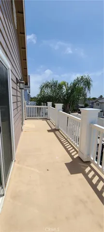 Upstairs balcony with direct access from second and third bedrooms.