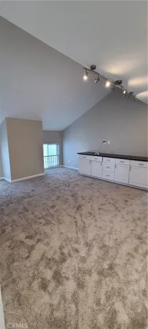 Upstairs loft, separating primary bedroom from second two bedrooms, for added privacy.