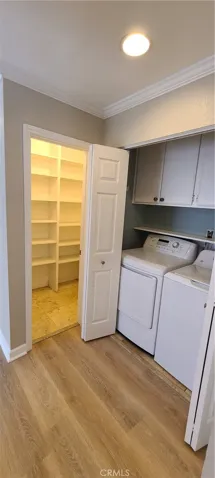 Laundry closet, near walk-in pantry and downstairs half bath.