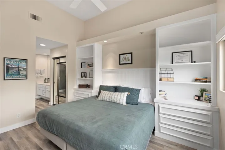 Primary bedroom with custom built ins