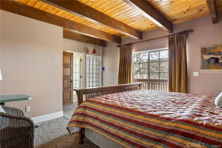 Main House:Master bedroom w/ private deck