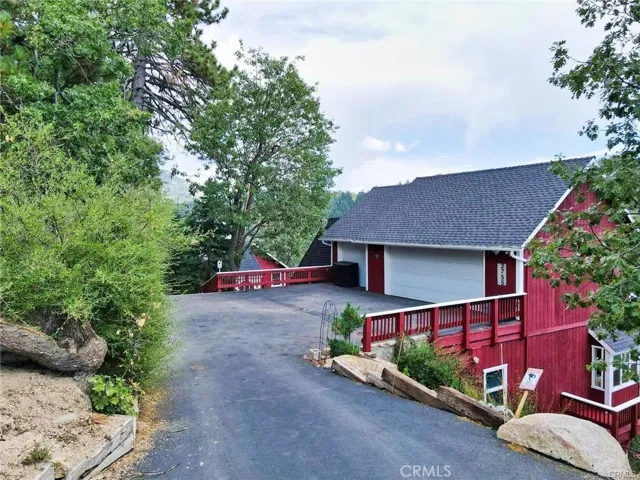 Drive way and 3 car garage.