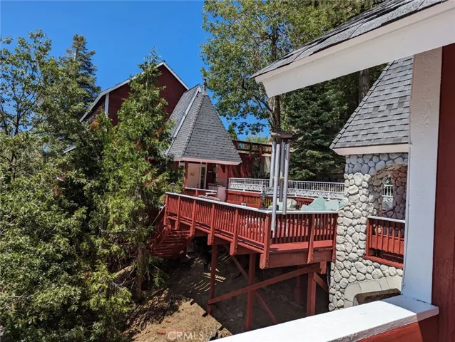 Deck between main house and studio/one bedroom apartment.