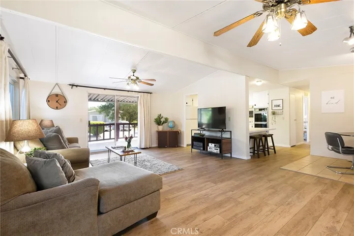 Light and bright with a patio door opening to a spacious covered 
deck